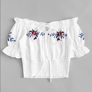 Off-shoulder floral crop top